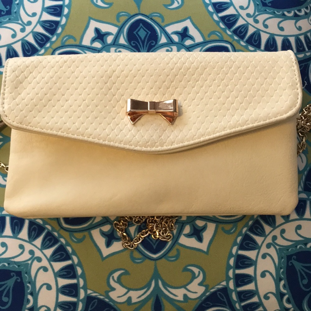 Cream colored clutch or wristlet